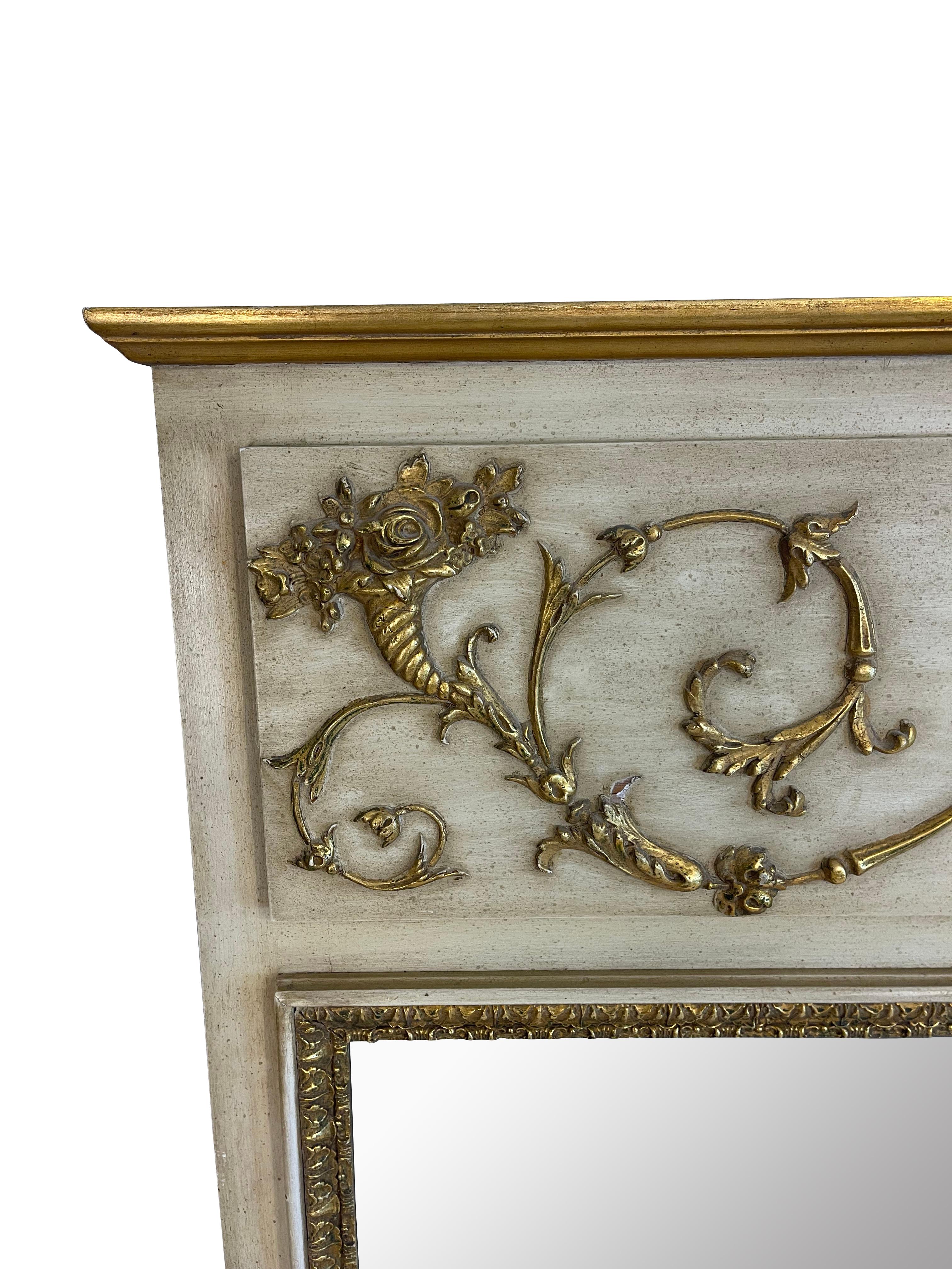 Carved Louis XVI Style Ivory and Gilt Trumeau Mirror