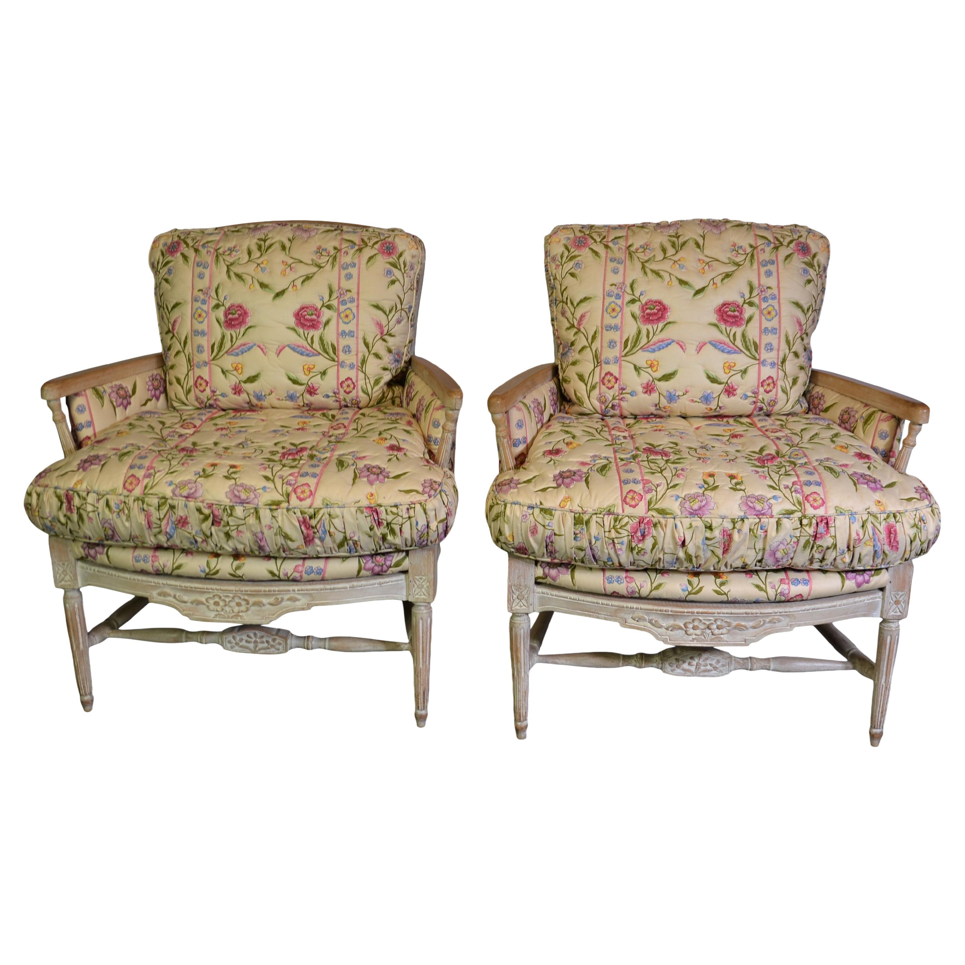 Pair of Louis xvi style ladder back armchairs. The chairs are covered in toile fabric, and the loose cushions are down-filled.