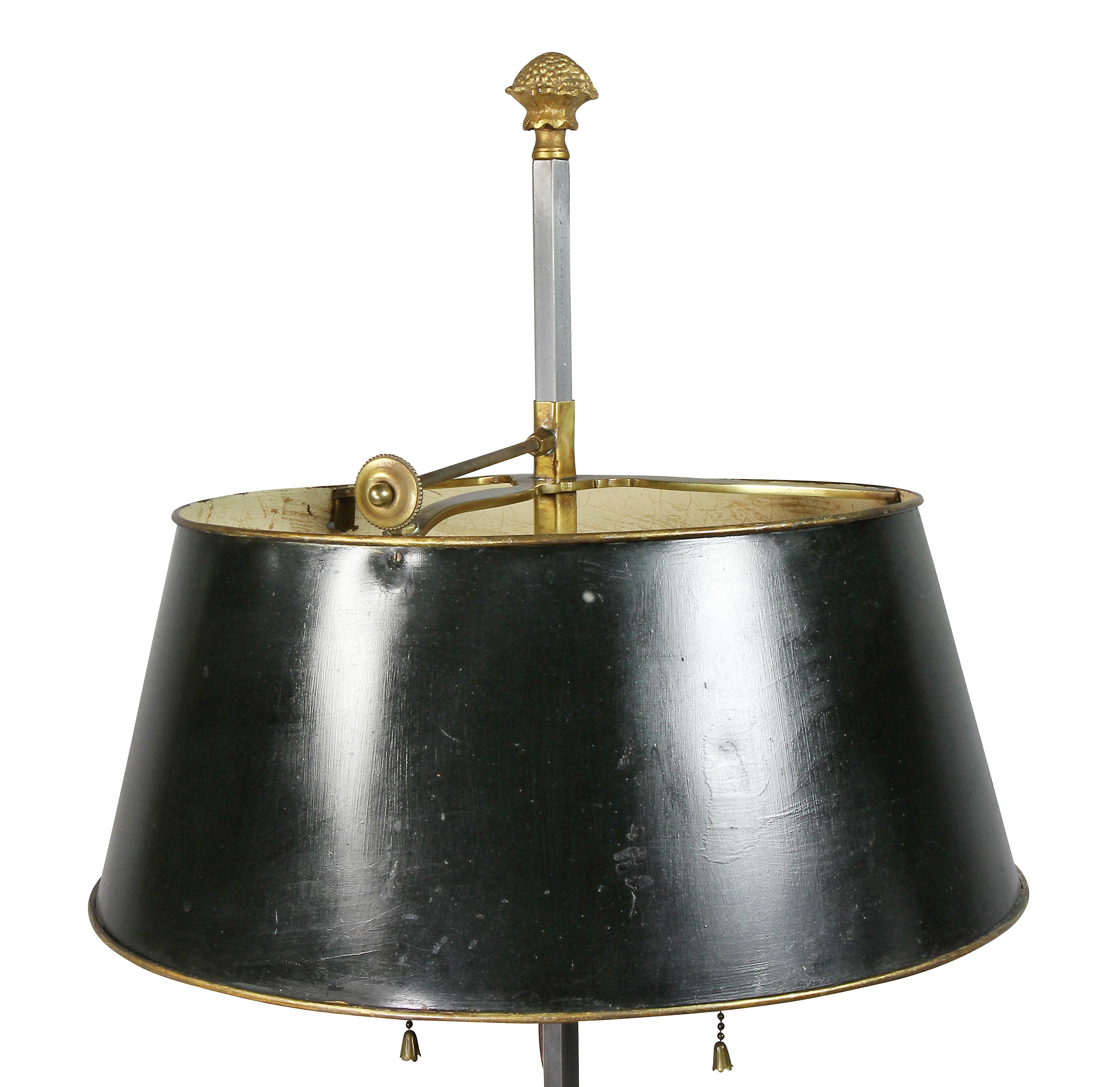 With conical green adjustable shade and gilt bronze finial, two-light and three lower candleholders over a mahogany and brass-mounted bowl.
