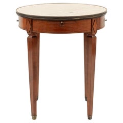 Table bouillotte en acajou de style Louis XVI
