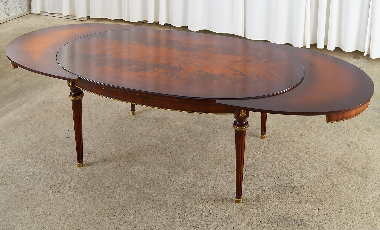 American Louis XVI Style Mahogany Bronze Oval Draw Leaf Dining Table