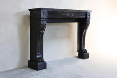 Louis XVI Style Mantle Surround of Noir de Mazy Marble from the 19th Century