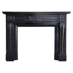 Louis XVI Style Mantle Surround of Noir de Mazy Marble from the 19th Century
