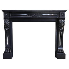 Louis XVI Style Mantle Surround of Noir de Mazy Marble from the 19th Century
