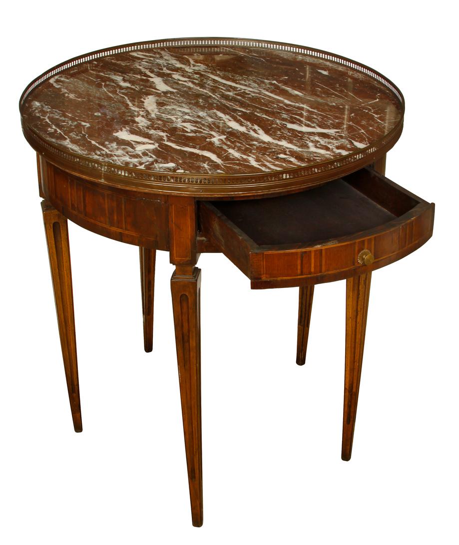 Louis XVI style marble Bouillotte table with inlay.