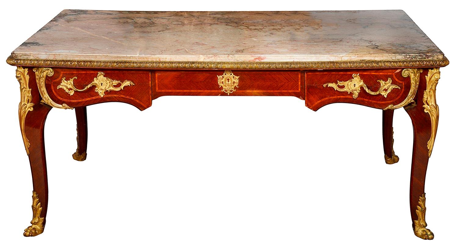 A very impressive and good quality 19th Century Louis XVI style marble topped centre table, having wonderful gilded ormolu mounts, mouldings and masks to the drawer fronts, frieze and legs. Three drawers to one side and dummy drawers to the reverse,