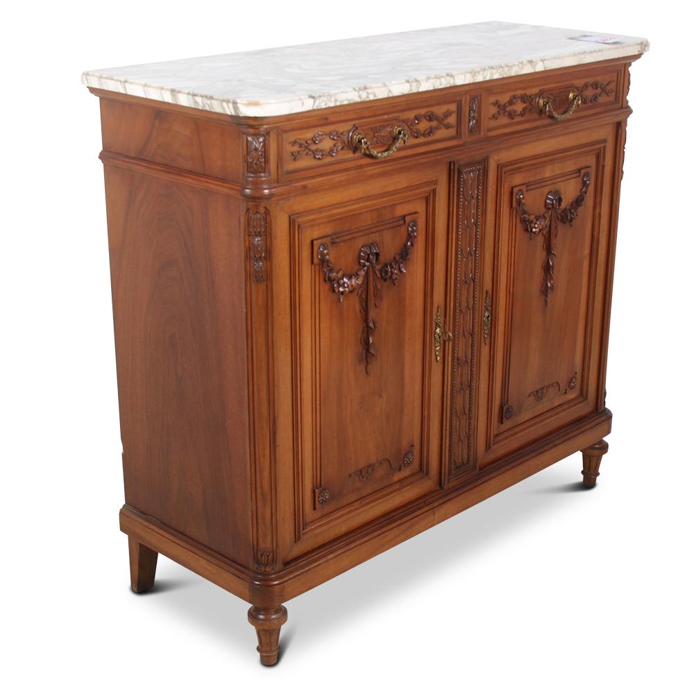 Superior quality, highly carved, French Louis XVI-style server in solid walnut with marble top. Beautifully cast detailed bronze mounts and pulls.



 