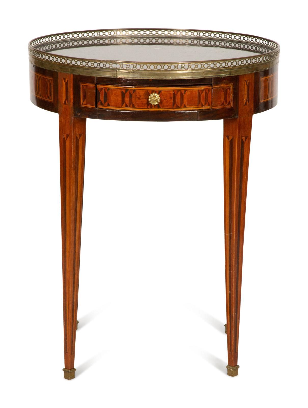Louis XVI Style Marquetry Marble-Top Gueridon with a Brass Gallery, Early 20th Century. Measures: Height 31 1/2 x diameter 24 inches.
 