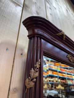 Louis XVI style mirror in mahogany and gilt
