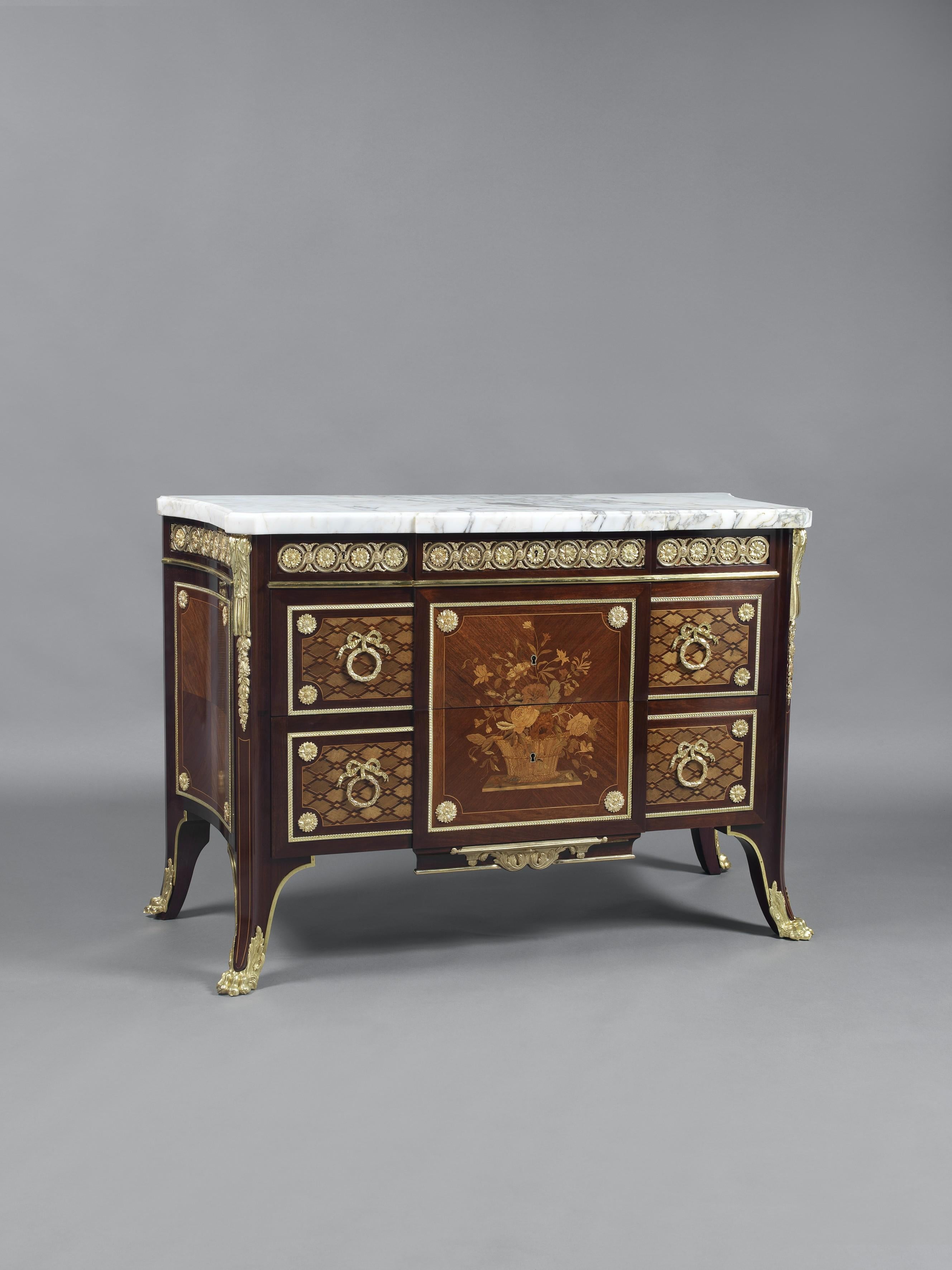 A Fine Louis XVI Style mahogany and Marquetry Inlaid neoclassical breakfront commode in the manner of Jean-Henri Riesener.

French, circa 1890. 

The bronzes stamped to the reverse ‘MK’.

This fine commode has a shaped Carrara Bianco marble