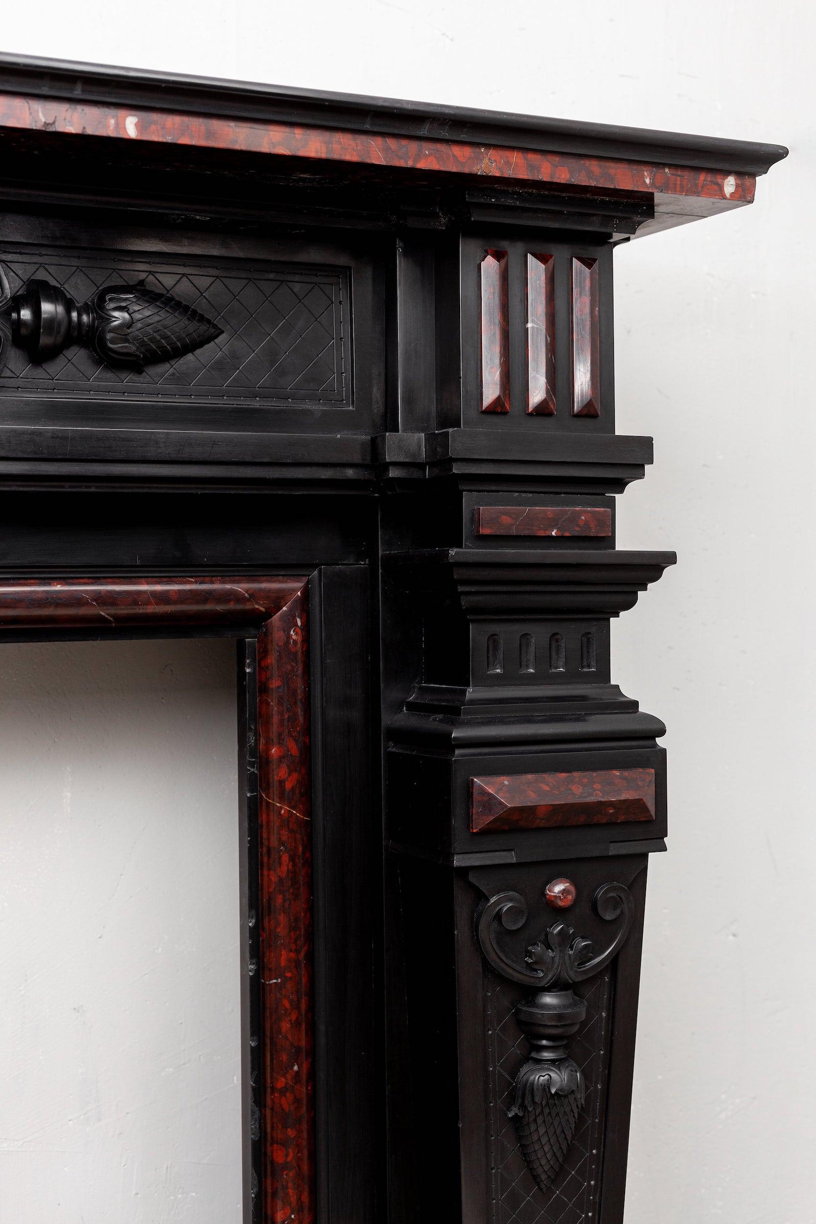 Hand-Carved Louis XVI Style Noir de Mazy Antique Fireplace For Sale
