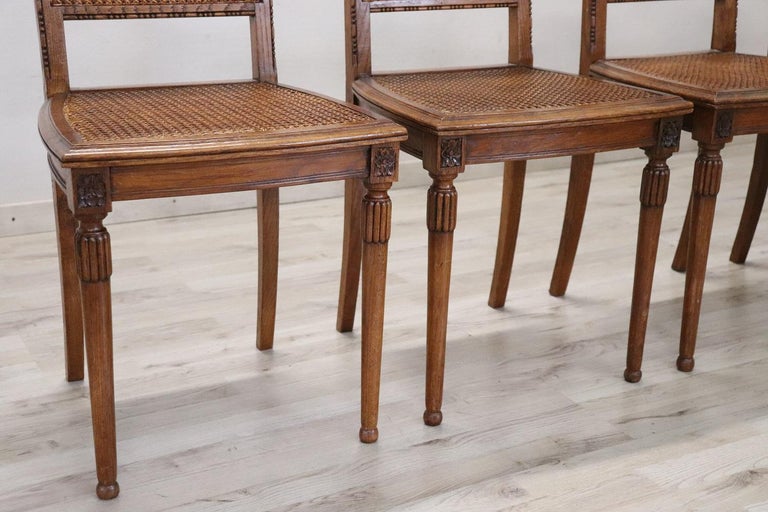 Series of six refined authentic Italian Louis XVI style oak wood chairs. The chairs are characterized by refined seat and back in Viennese straw hand made according to the ancient weaving method. Beautiful chairs ready to be placed in your beautiful