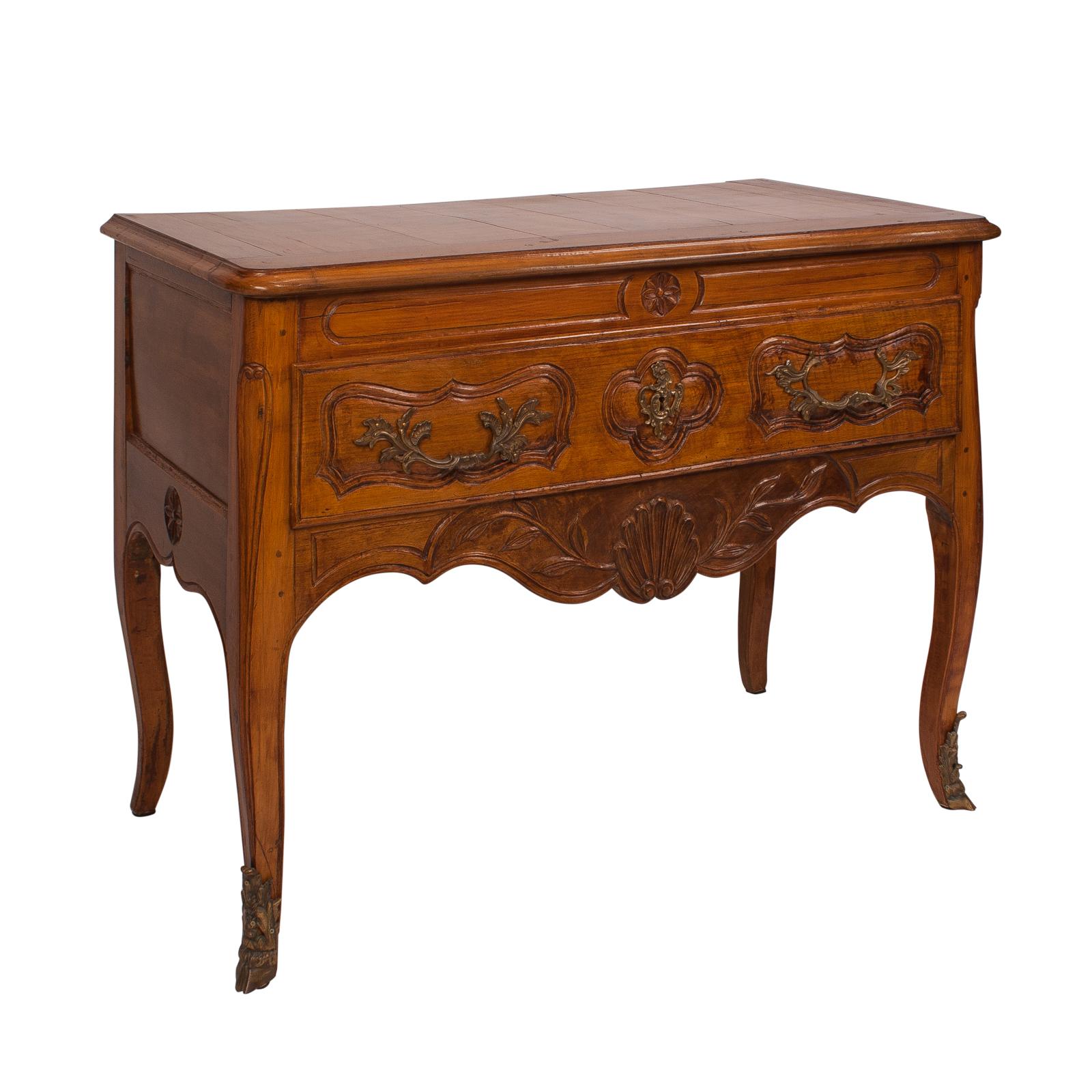 A 19th century Italian fruitwood one drawer table in the Louis XVI style, 19th century.
