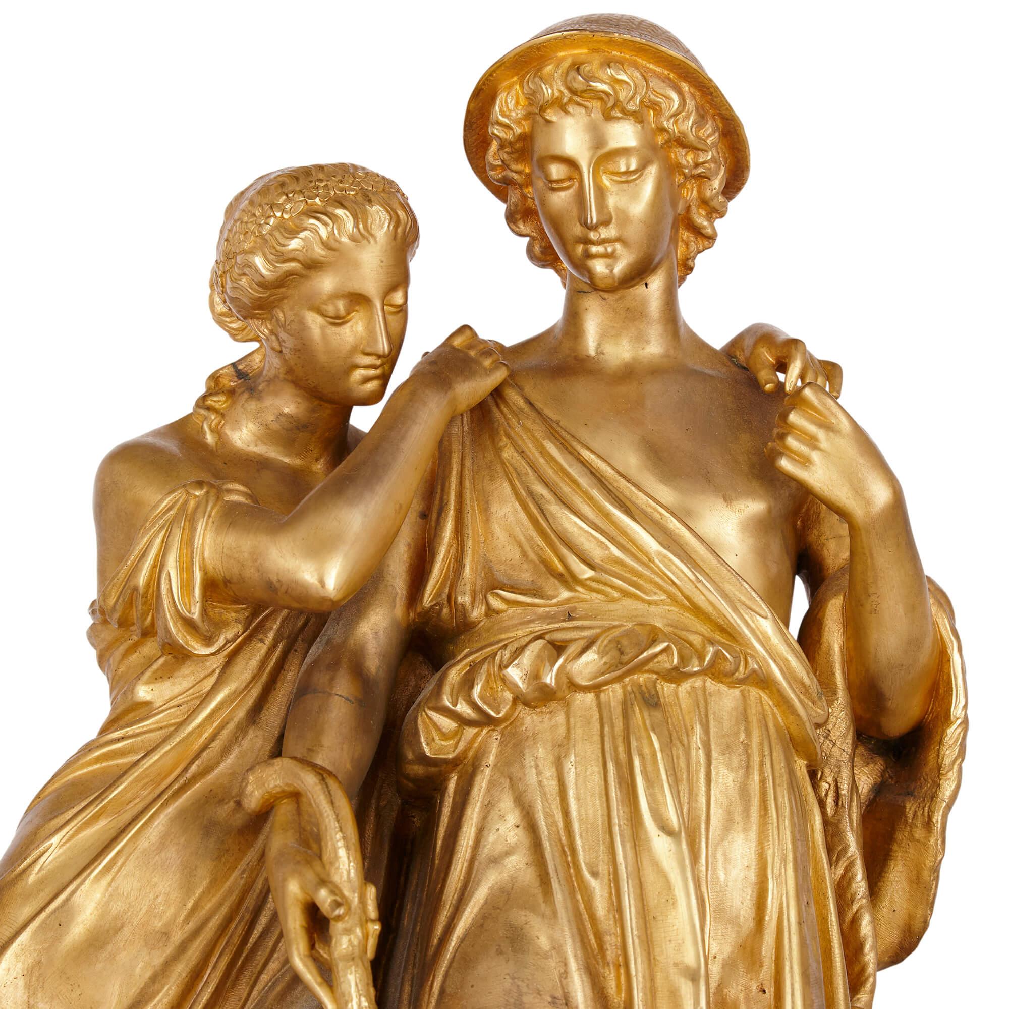 XIXe siècle Ensemble d'horloges de style Louis XVI en bronze doré et marbre rouge griotte en vente