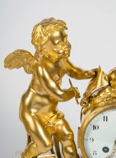 Louis XVI Style Ormolu and White Marble Mantel Set, 19th Century.