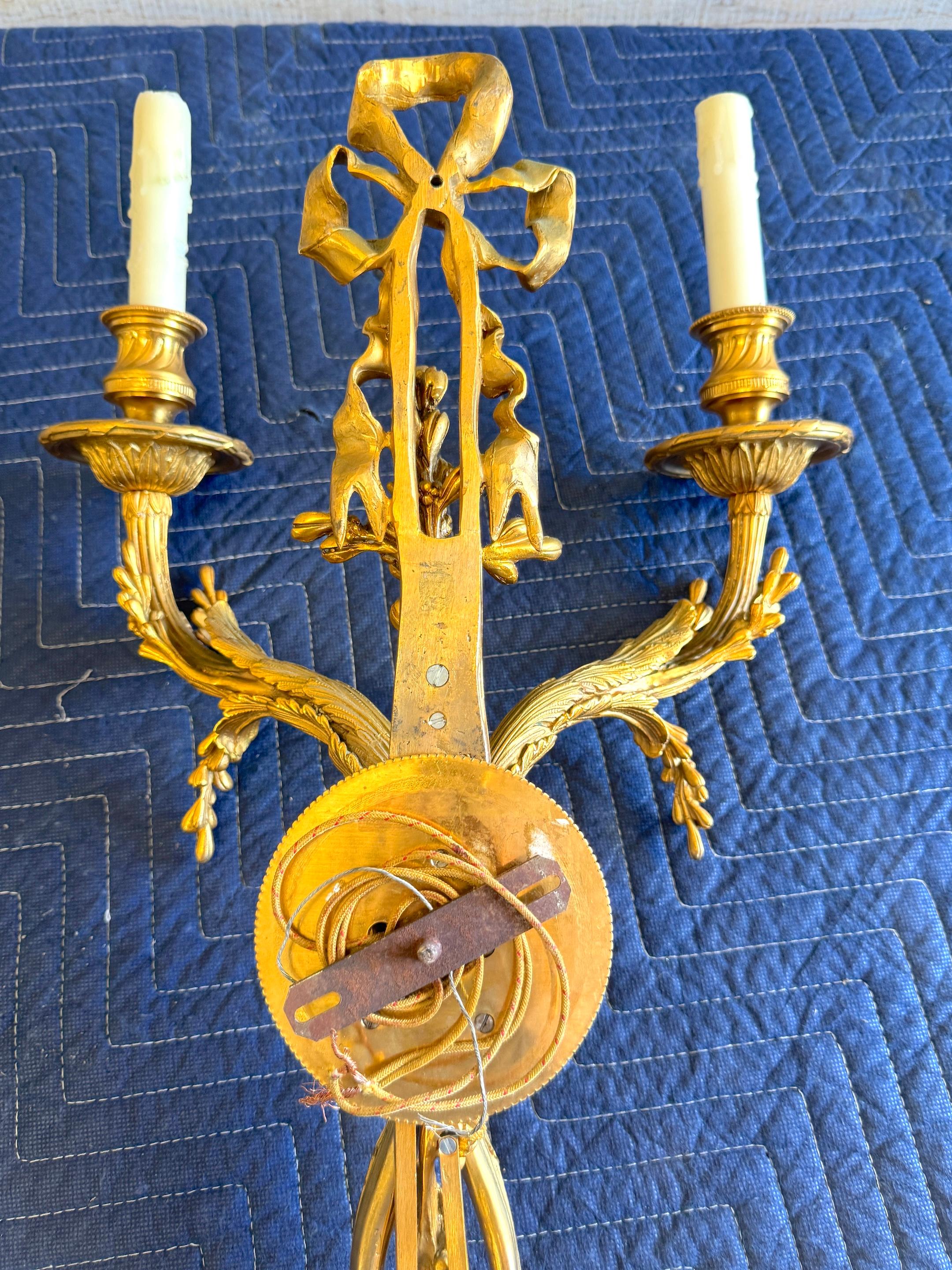 Louis XVI Style Ormolu Two‑Light Sconces, Attributed to P.E. Guerin For Sale 11