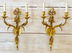 Louis XVI Style Ormolu Two‑Light Sconces, Attributed to P.E. Guerin