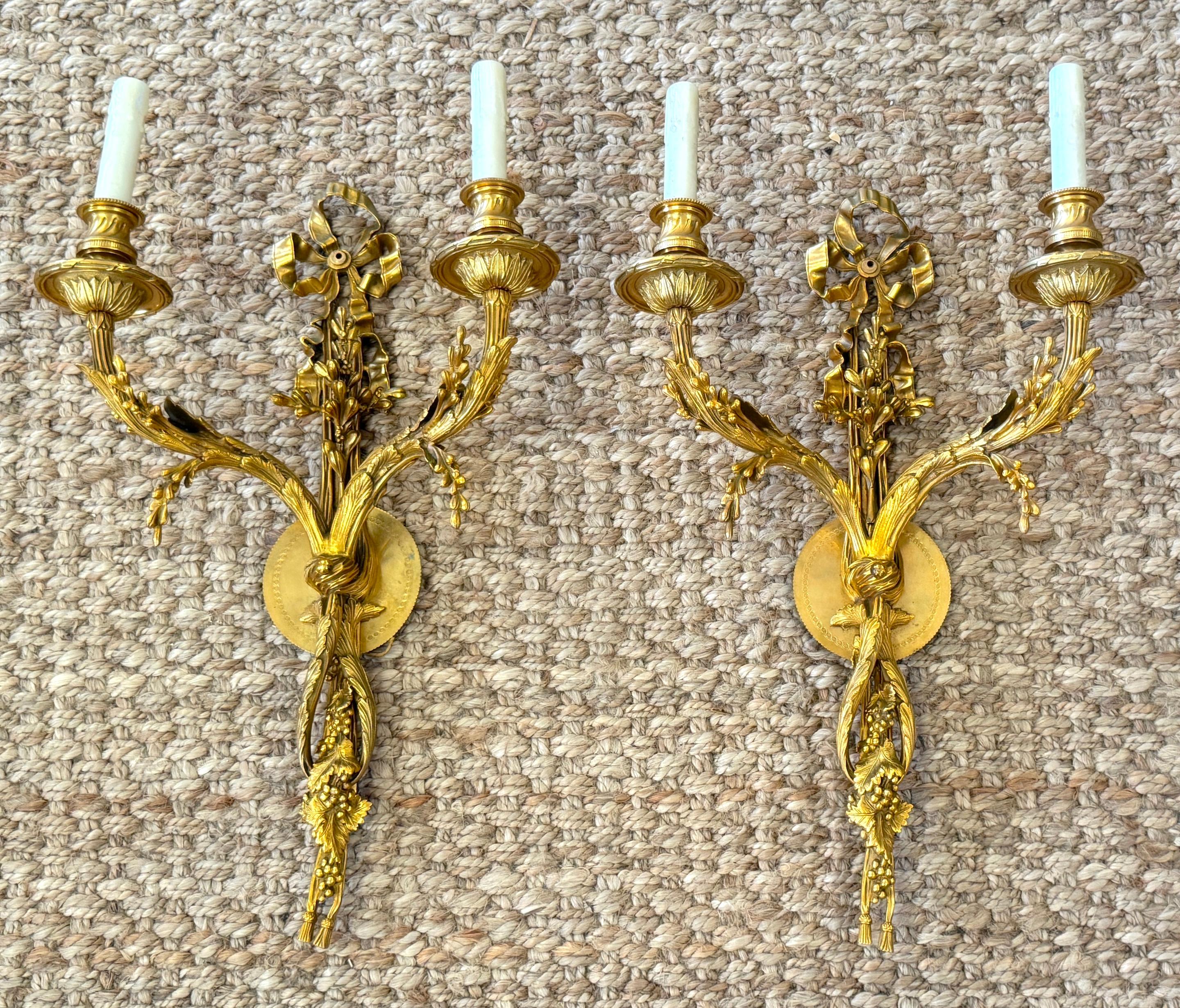 Engraved Louis XVI Style Ormolu Two‑Light Sconces, Attributed to P.E. Guerin For Sale