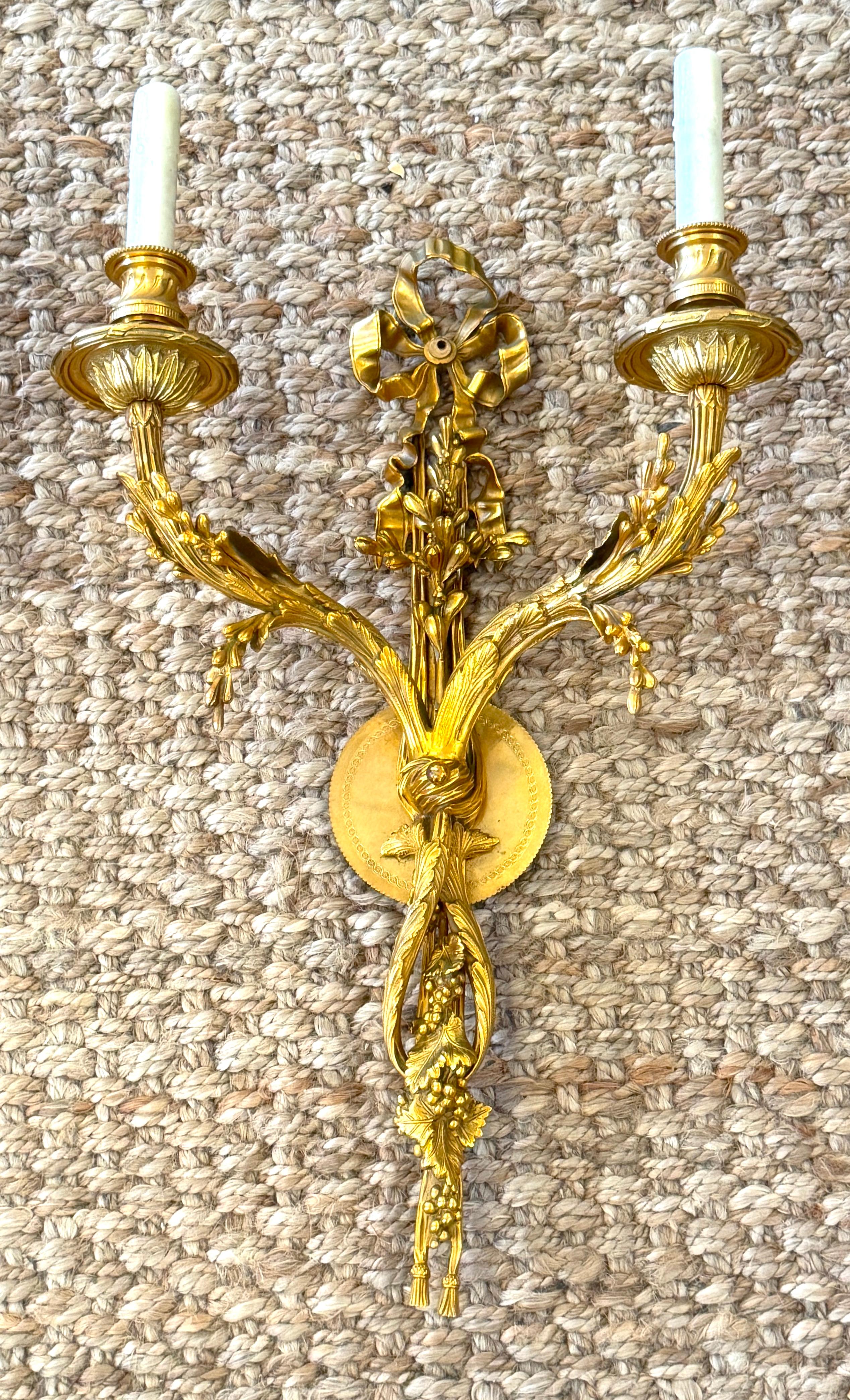 Louis XVI Style Ormolu Two‑Light Sconces, Attributed to P.E. Guerin In Good Condition For Sale In West Palm Beach, FL