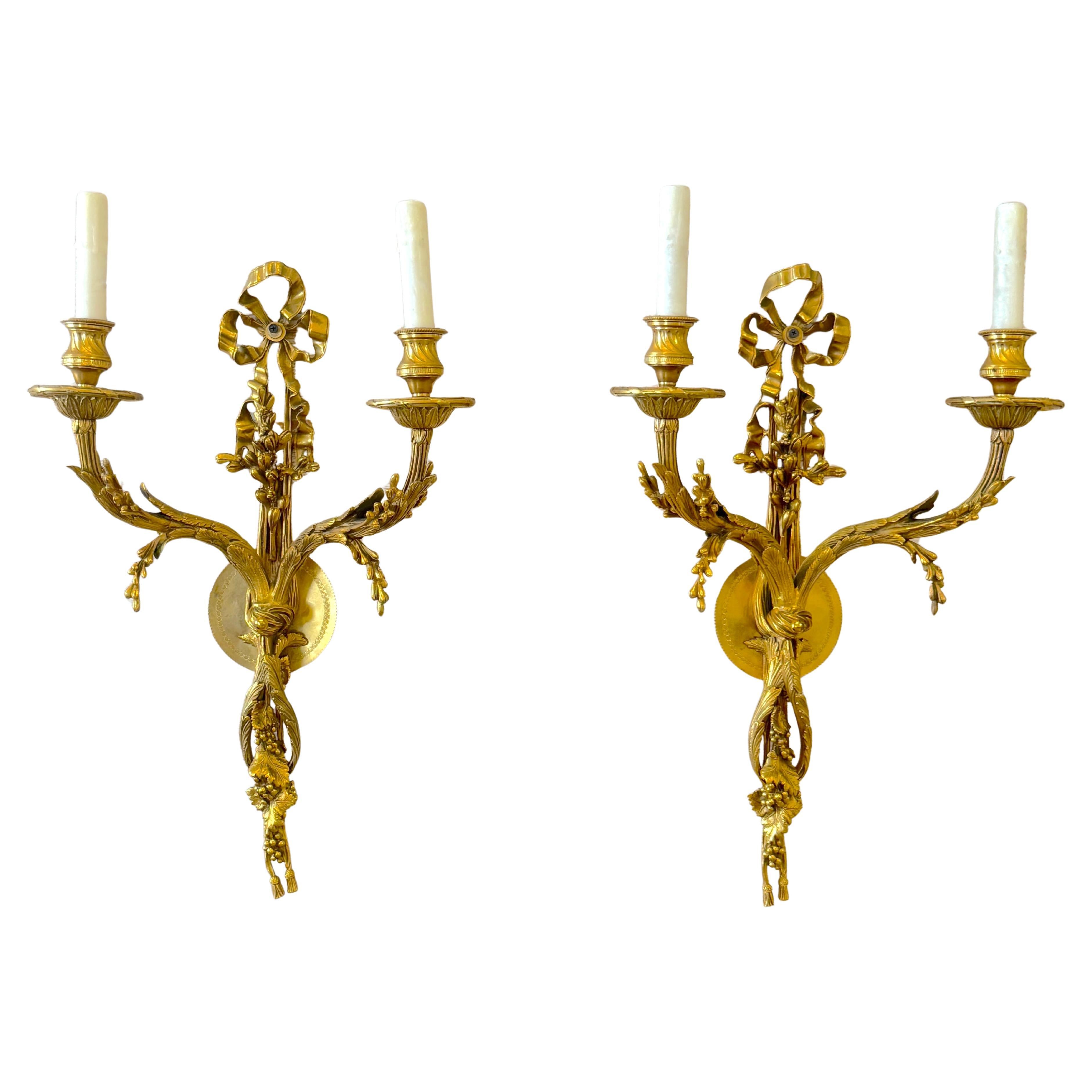 Louis XVI Style Ormolu Two‑Light Sconces, Attributed to P.E. Guerin For Sale