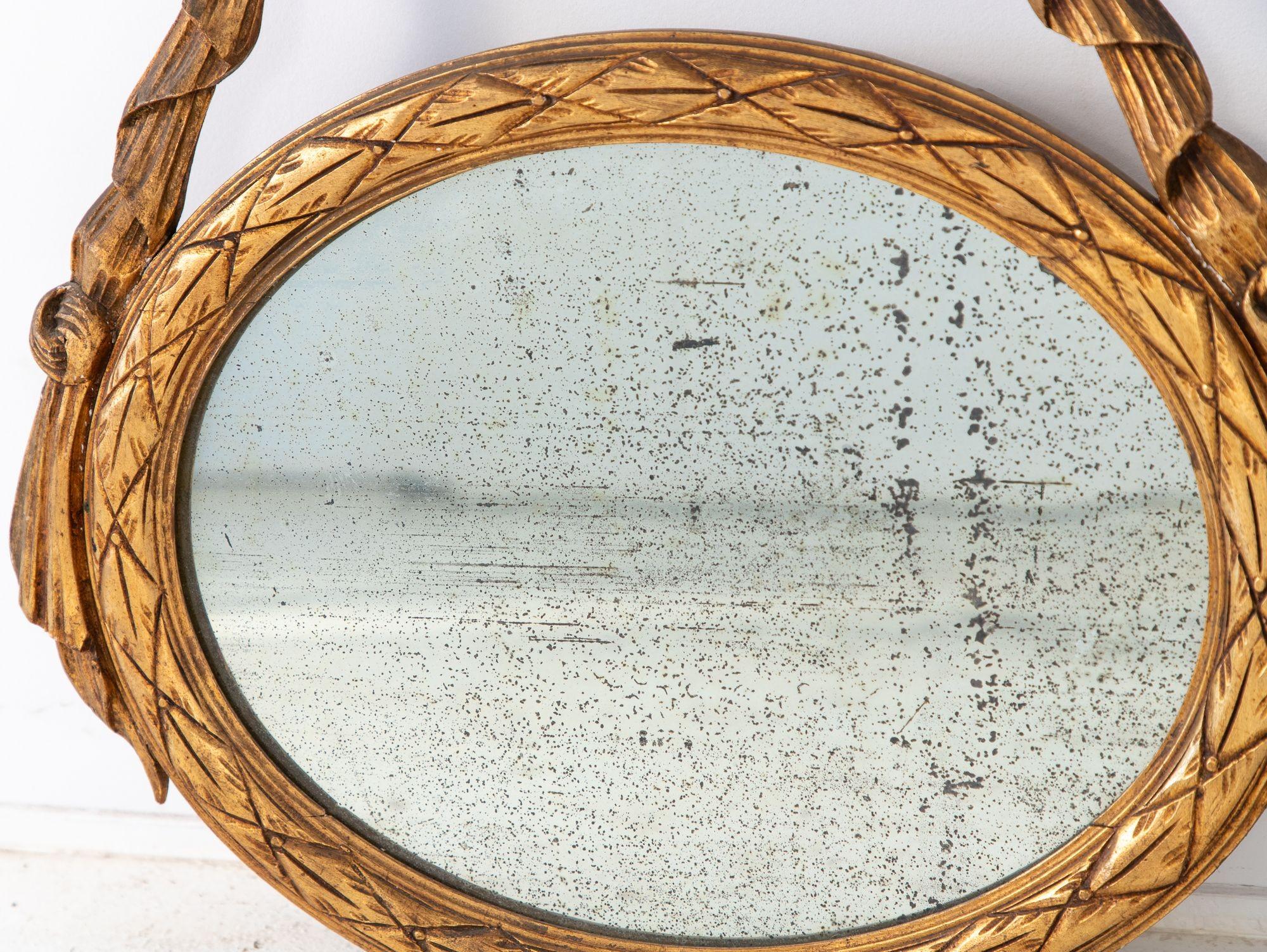 Louis XVI-style Oval Mirror with Carved Wood Frames, France Mid 20th C. In Good Condition For Sale In South Salem, NY