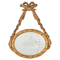 Louis XVI-style Oval Mirror with Carved Wood Frames, France Mid 20th C.
