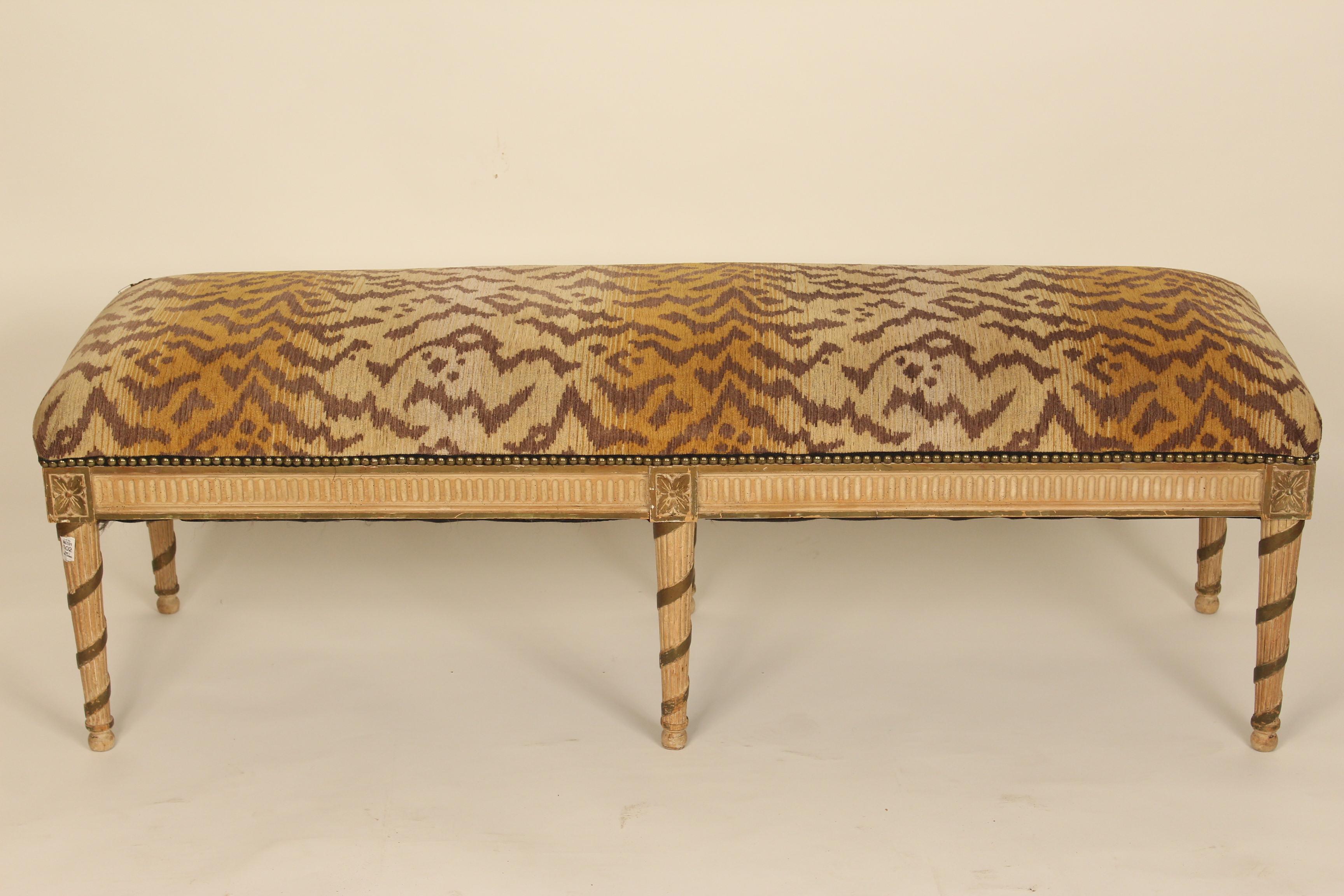 Louis XVI style painted and partial gilt bench with leopard style upholstery, circa 1970s. Very desirable 59