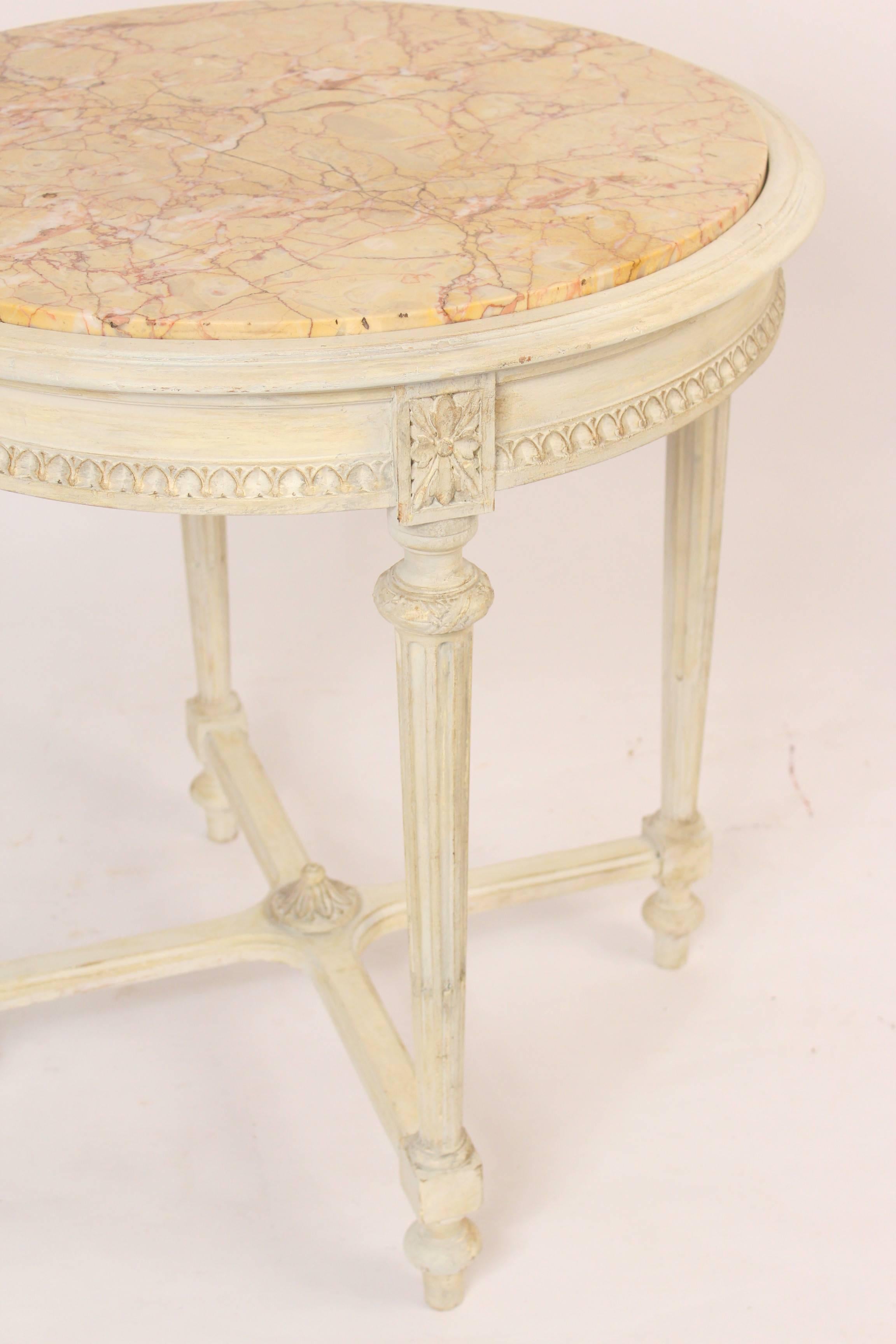 Louis XVI style painted round gueridon with marble top, circa 1920.