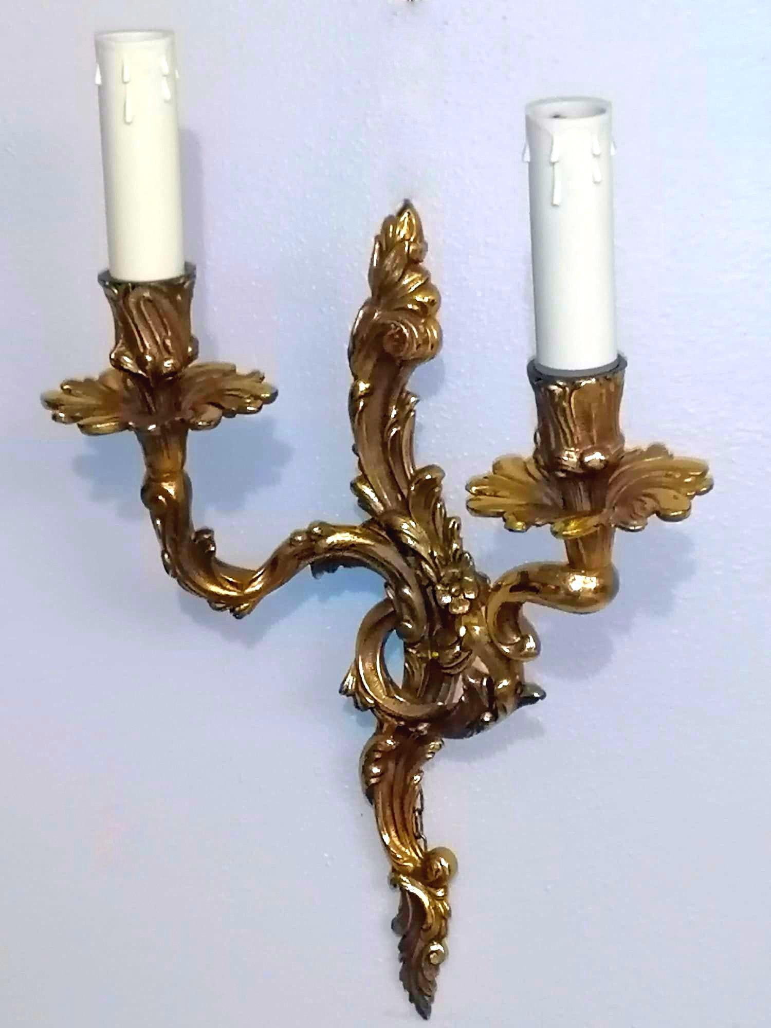 Gilt Louis XVI Style Pair of French Wall Sconces in Gilded and Chiseled Bronze For Sale