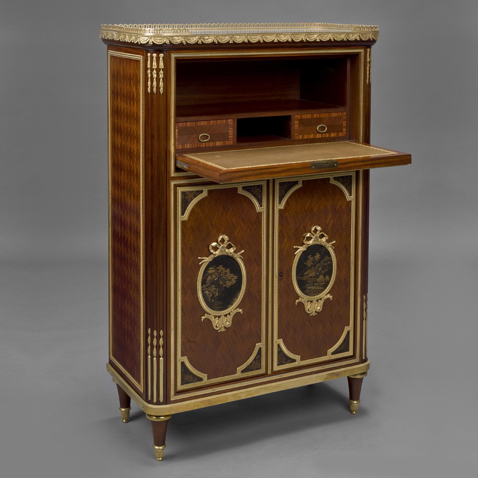 A Fine Louis XVI Style Parquetry, Gilt-Bronze and Lacquer Mounted Petit Secretaire Cabinet, Attributed to Maison Beurdeley. 

Stamped to the reverse of the bronze mounts to the bottom columns 'H.B. 47', stamped to the reverse of the bronze mounts to