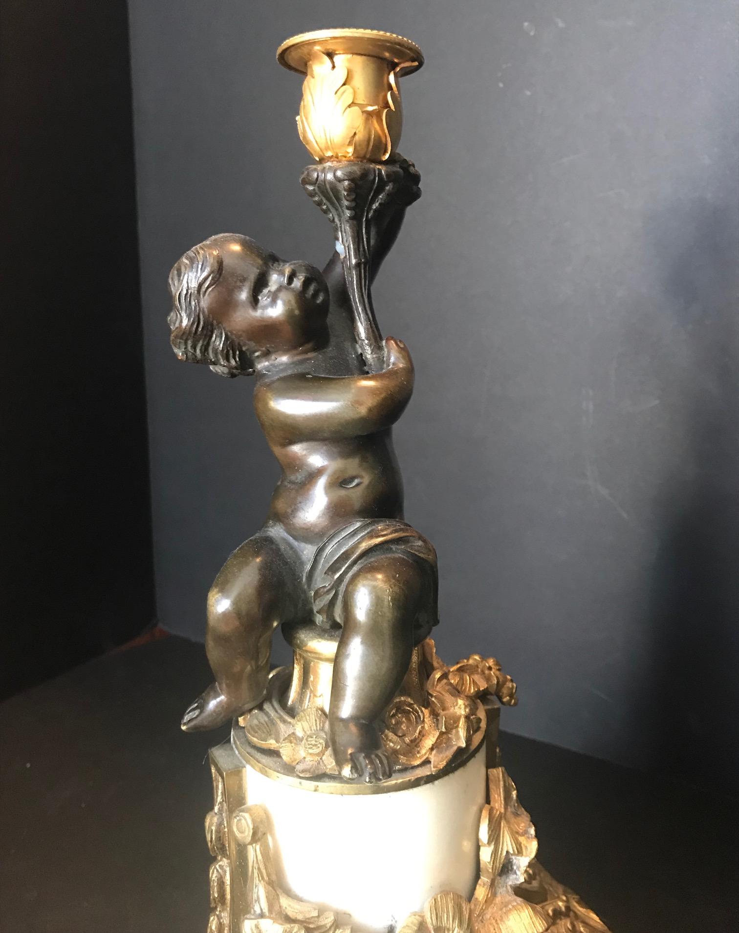 Gilt Louis XVI Style Putto Ormolu Patinated Bronze and Marble Candlestick For Sale