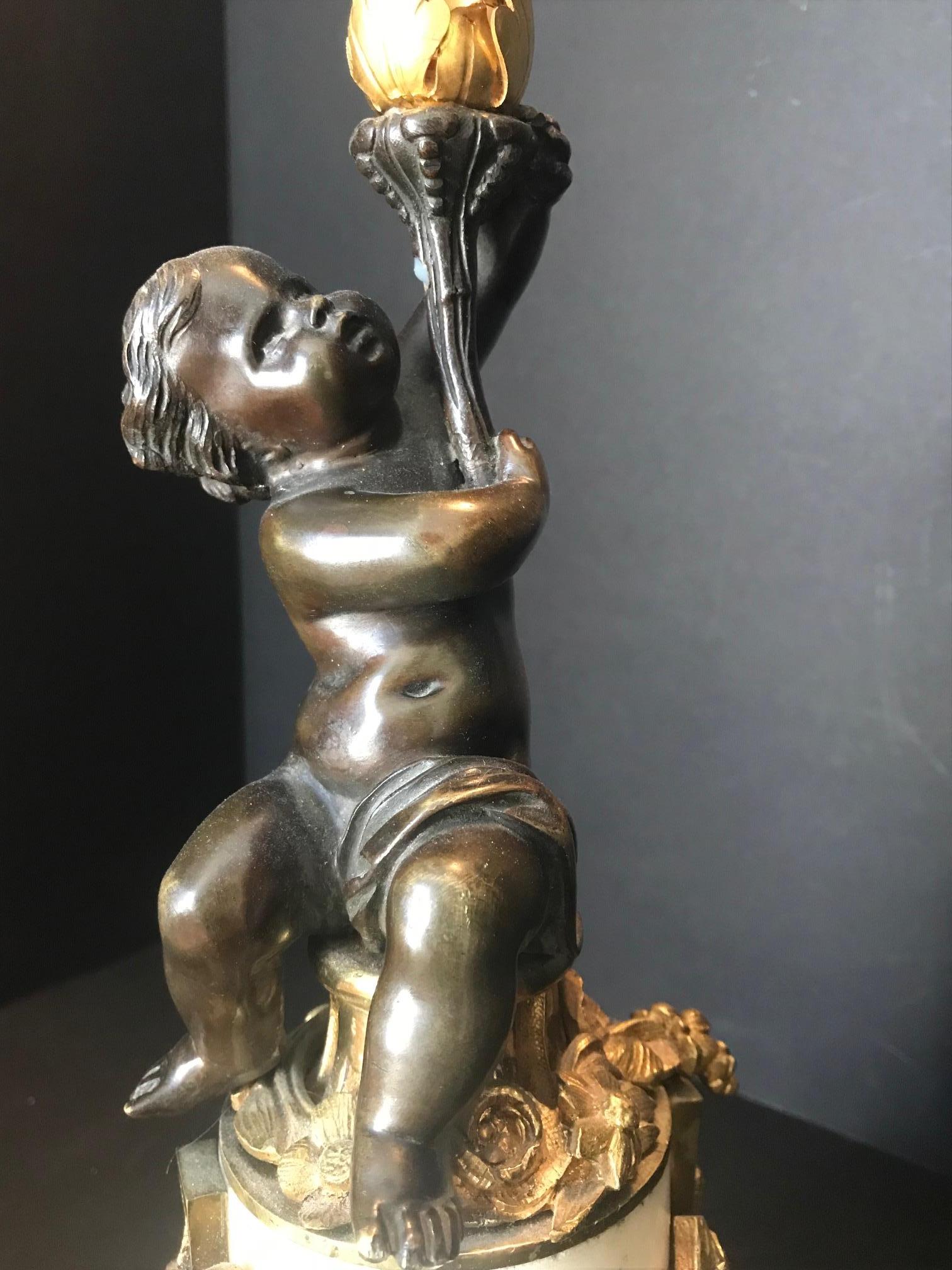 Carrara Marble Louis XVI Style Putto Ormolu Patinated Bronze and Marble Candlestick For Sale