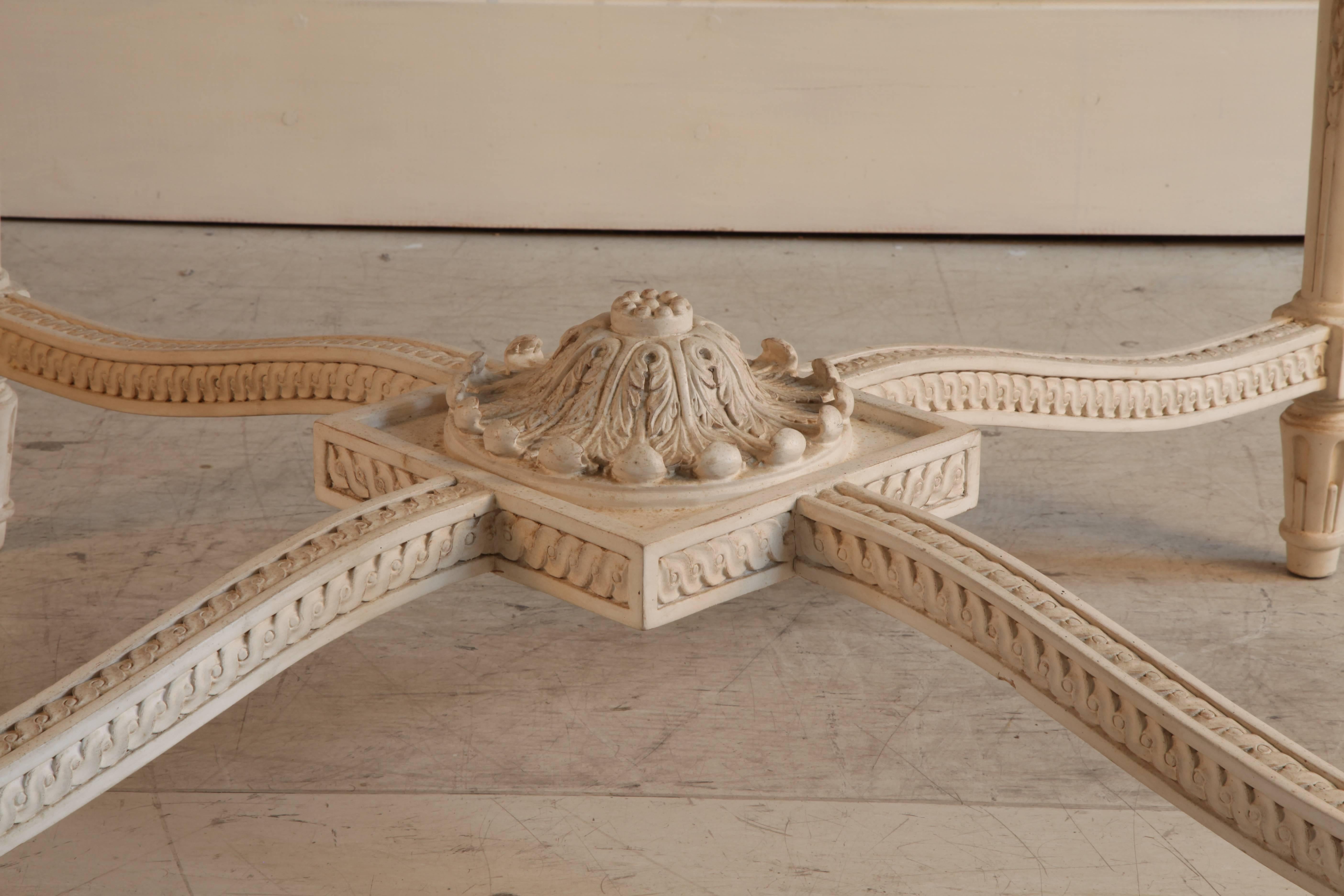 Hand-carved Louis XVI style round table, finished in a gesso white with a light french grey aged patina.
We can supply a marble top on quotation if you wish.