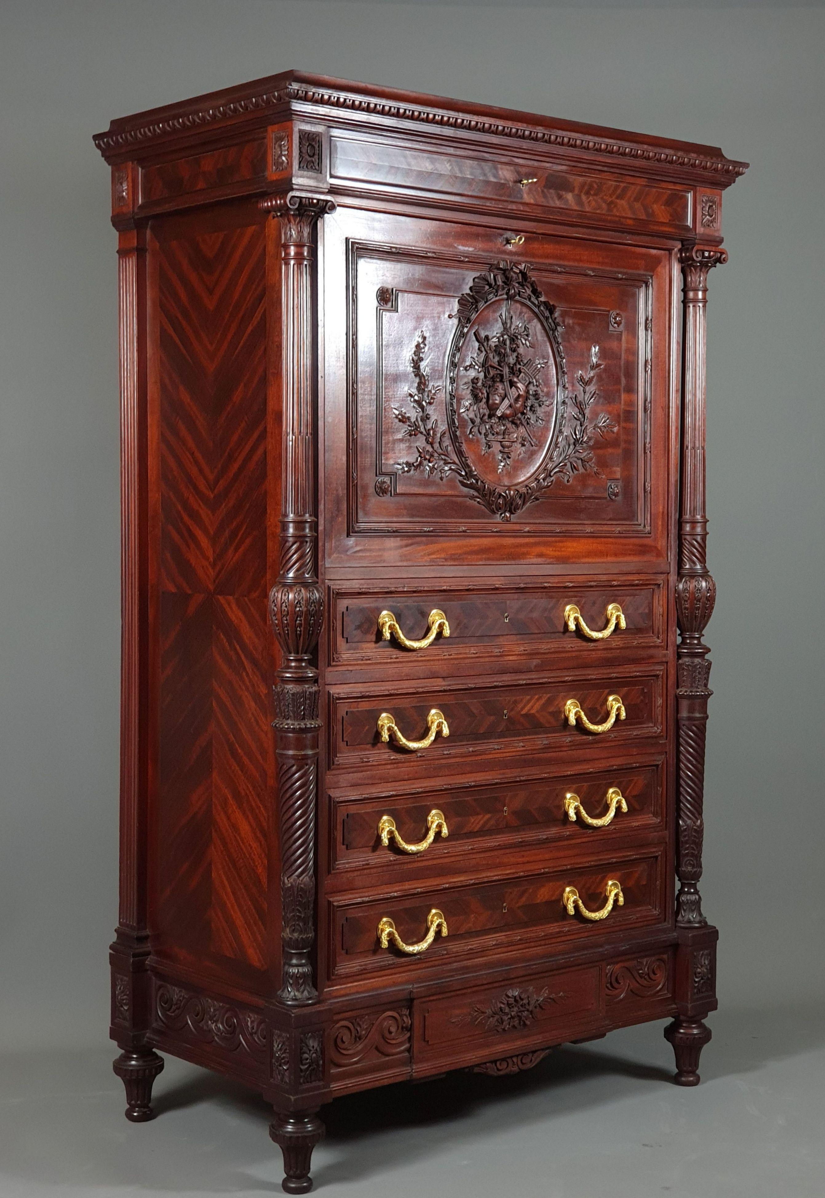 Gustave-Frédéric Quignon

Superb Louis XVI style piece of furniture in very finely carved solid mahogany forming a secretary / document holder cabinet.
Opening 6 drawers including a secret one at the bottom, and a central flap revealing an inlaid