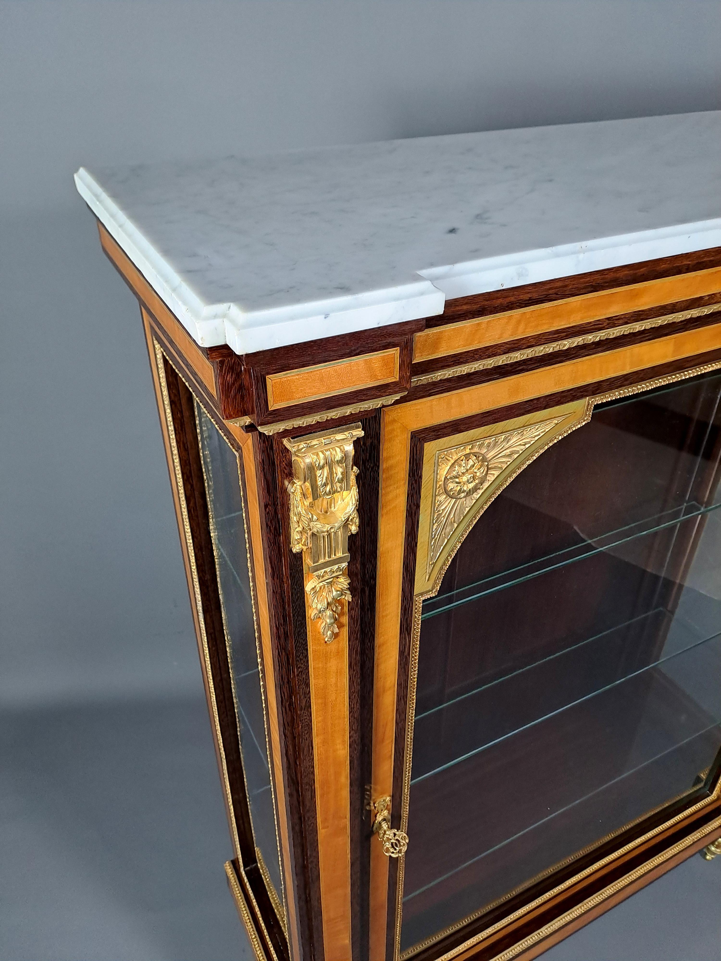 19th Century Louis XVI Style Showcase In Marquetry And Gilt Bronze For Sale