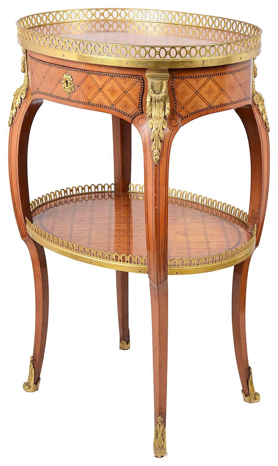 A very good quality late 19th century Louis XVI style Donald Ross two-tier side table, having fine marquetry inlay to the top, a brass gallery. A single frieze drawer, raised on cabriole legs with inlaid, galleried under tier.
