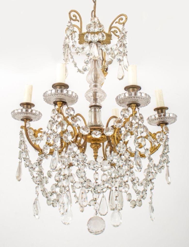 Louis XVI Style Gilt Metal and Cut Glass Six-Light Princess Chandelier, with scroll form arms and faceted glass swags motif. 