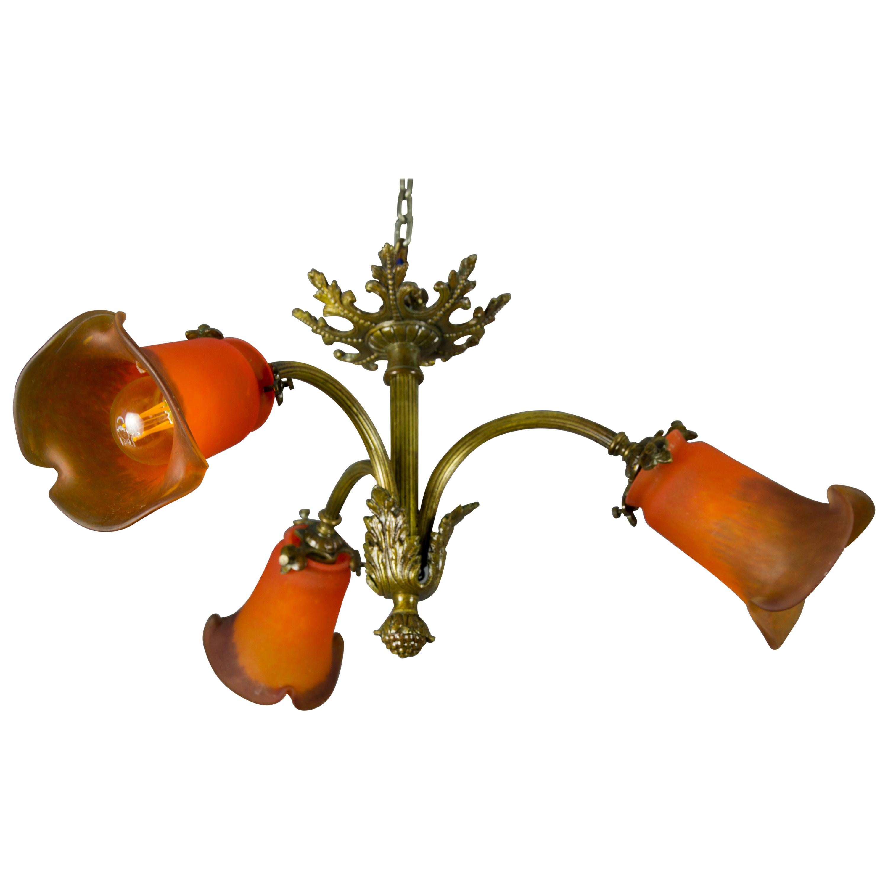 Louis XVI Style Bronze and Red Pâte de Verre Glass Three-Light Chandelier