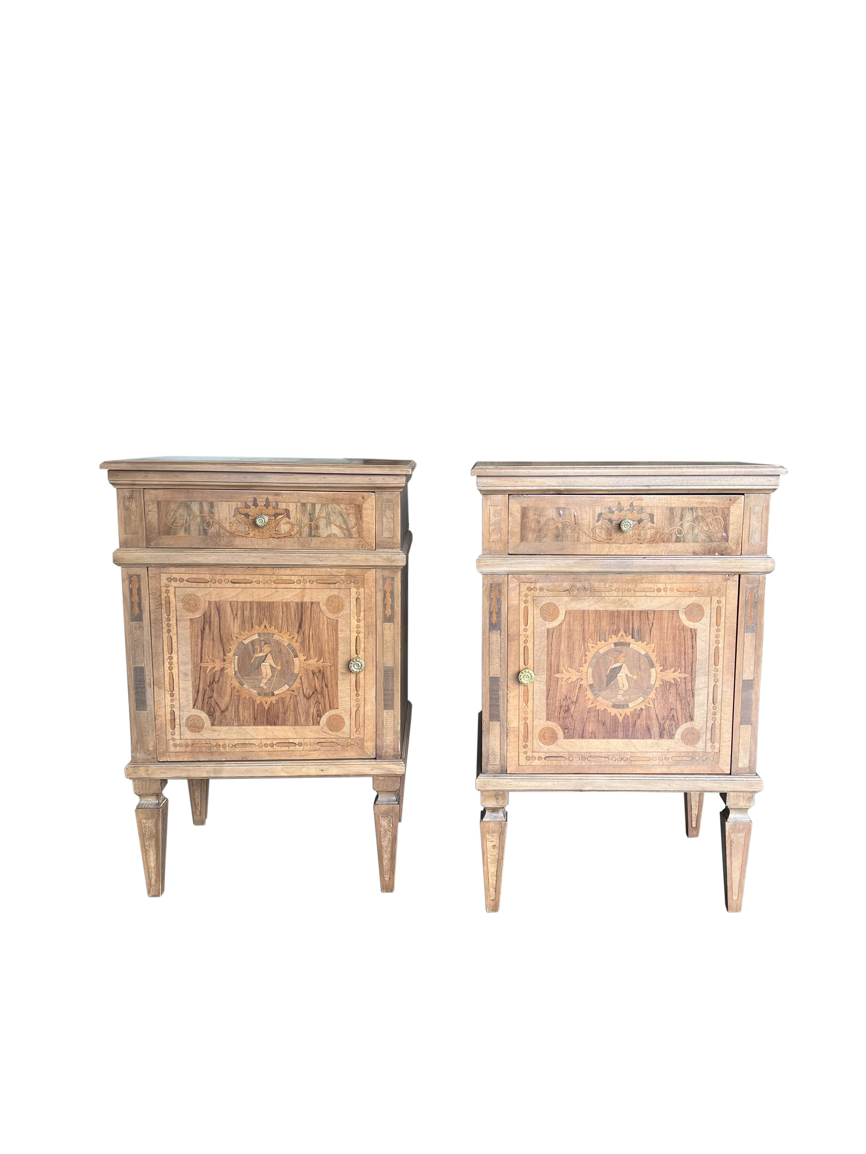 Handsome Louis XVI Style Italian walnut pair of nightstands with burl inlay marquetry, Tuscany circa 1920. Single upper drawer with dovetail joinery above the door, with brass pulls. Fine arts & crafts detail exhibited in a trim, modern