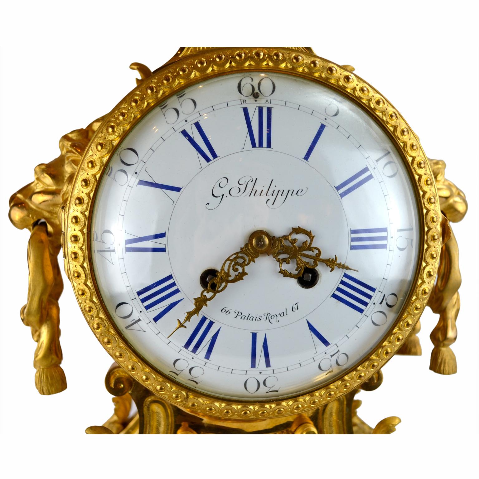 Gilt Louis XVI Style Urn and Lions Head Clock