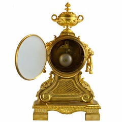 Louis XVI Style Urn and Lions Head Clock