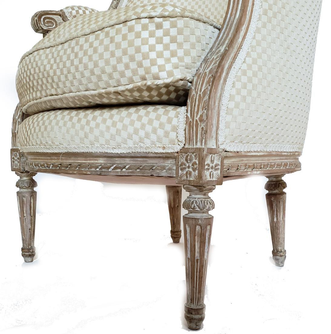 Louis XVI style velvet barrel back chair, with cream checkerboard geometric upholstery and painted frame.
