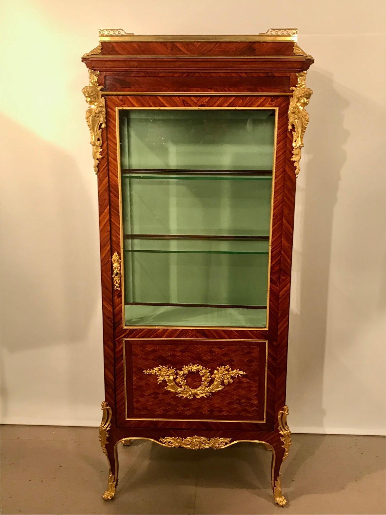 It is difficult to sufficiently describe the quality and workmanship of this vitrine; the photos show more than any words can relate. The mounts are to the standard of the great Linke and may prove to be from his own workshop. Those which flank the
