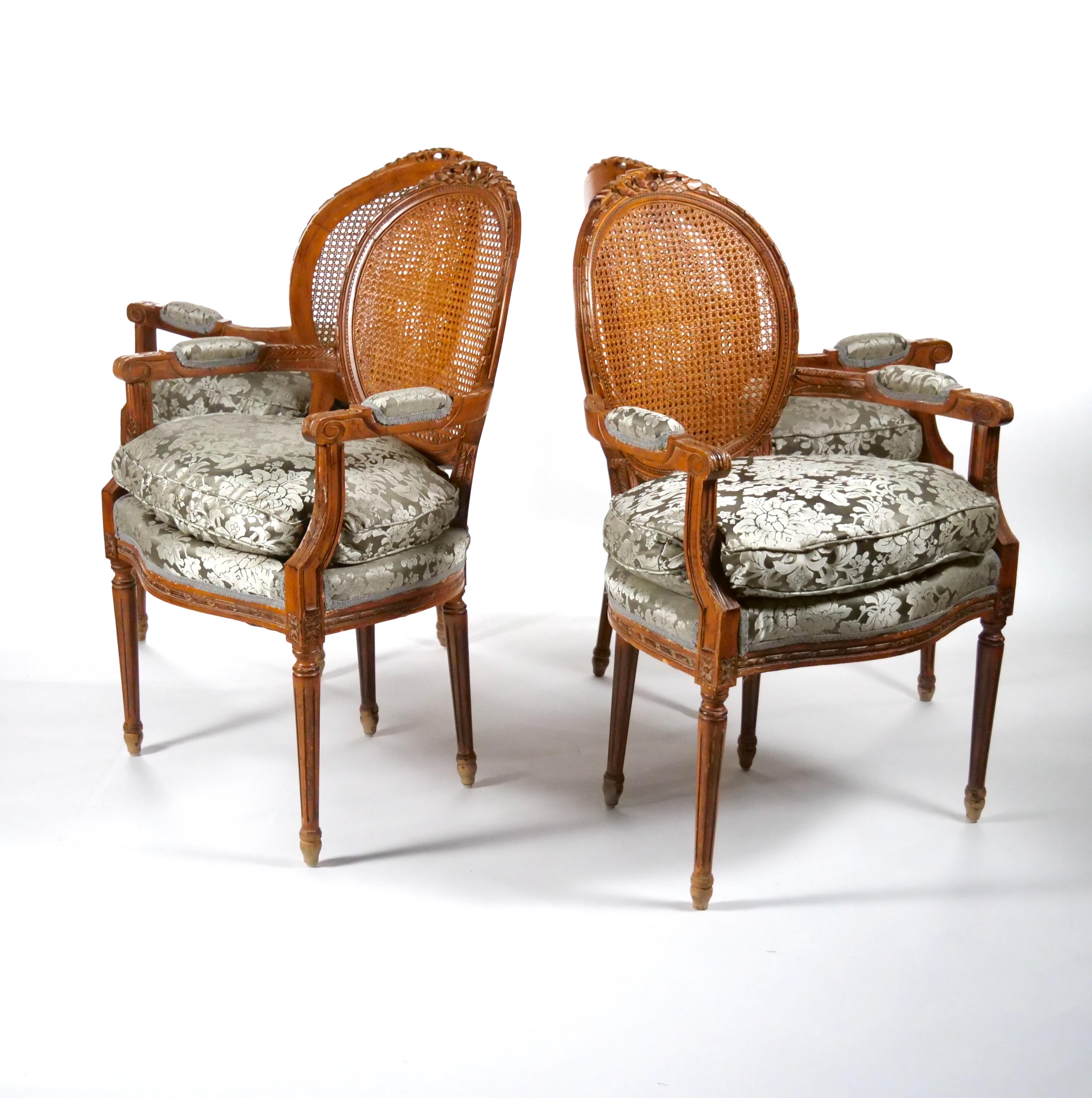 Hand-Carved Louis XVI Style Walnut Caned Needlepoint Lounge Chairs For Sale