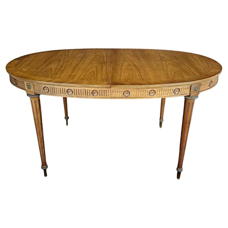 Louis XVI Style Walnut Dining Table with Two Leaves and Bronze Carved Medallions