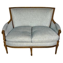 Louis XVI Style Walnut Settee with Blue Fabric
