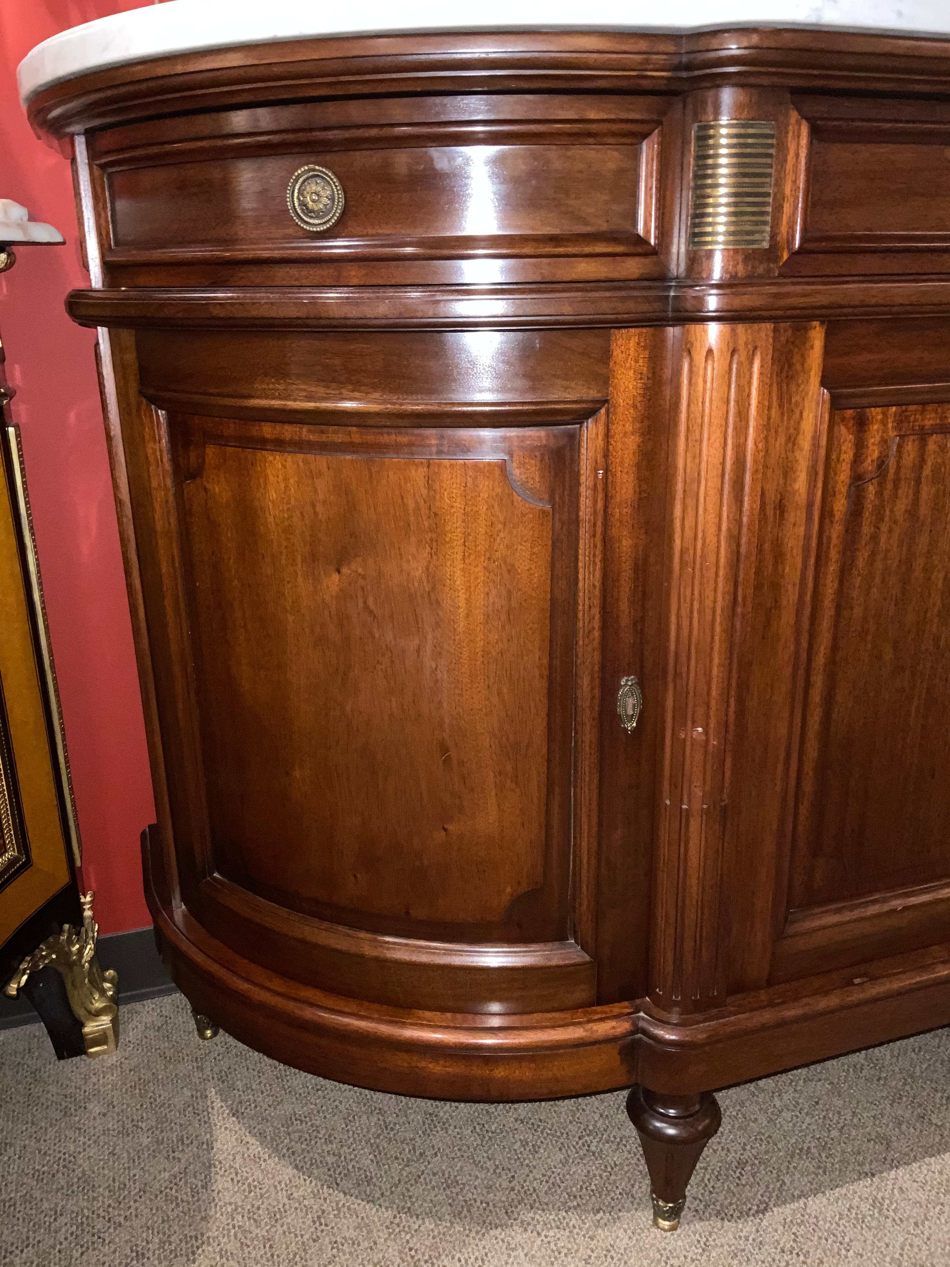 curved white sideboard