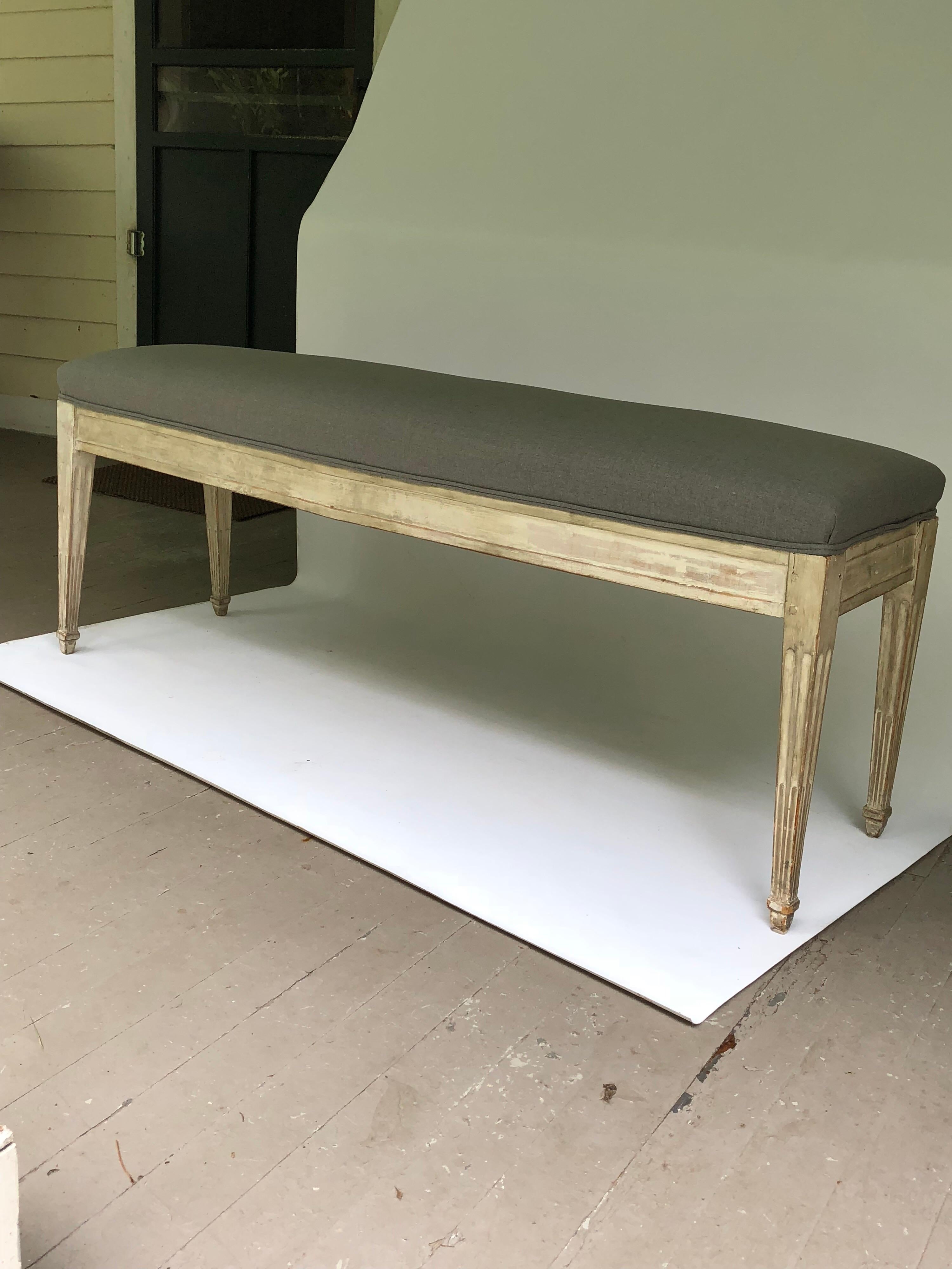 Louis XVI-style white painted bench upholstered in grey cotton fabric. Probably Scandinavian.
Few stains on the upholstery, but still serviceable.