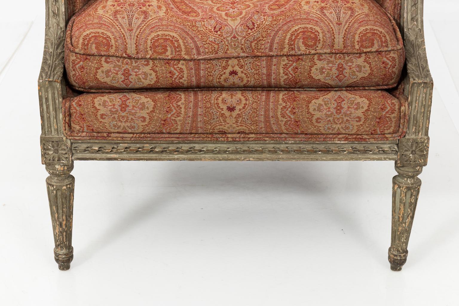 Louis XVI style painted and carved French wing chair, circa 1920s.
 