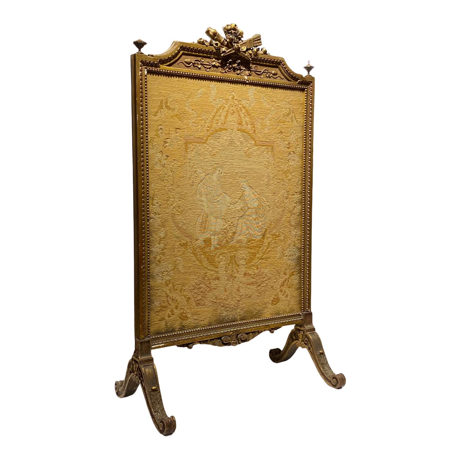A French circa 1900 Louis XVI Style carved wood and petitpoint fire screen.